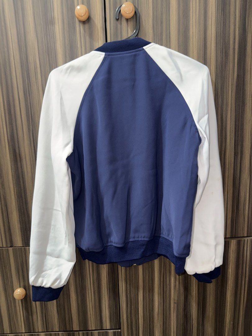 Michael Kors Bomber Jacket Navy White XXS (Category: Coats, Jackets and Outerwear) located in San Pedro. Submitted by artiizzza (Listing ID 1461599725, Image 2). Description: - Michael Kors navy and white bomber jacket - Raglan sleeves with arm stripes - Ribbed cuffs and hem - Minor stains on white sleeves (visible in last two photos) !!Delivery fee shouldered by buyer.