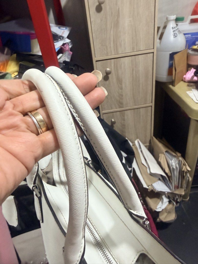 Michael Kors Saffiano top handle (Category: Luxury Bags & Wallets) located in Manila. Submitted by luxurylover88888 (Listing ID 1461765126, Image 3). Description: Presentable and useable condition Very nice white color.