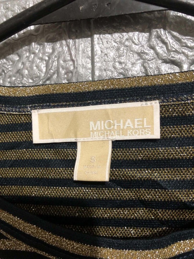Micheal Kors Top (Category: Sleeveless) located in Manila. Submitted by wildshark-33d3 (Listing ID 1461764730, Image 3). Description: Authentic Excellent condition Size Small on tag No issue.