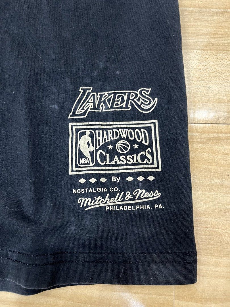Mitchell & Ness Lakers T-Shirt (Category: Tshirts & Polo Shirts ) located in Angeles City. Submitted by thriftsij (Listing ID 1461793293, Image 3). Description: - Brand: Mitchell & Ness - Team: Los Angeles Lakers - Collection: Hardwood Classics - Material: 100% Premium Cotton - Size: Medium (M) - Ideal for: Basketball fans, Lakers supporters.