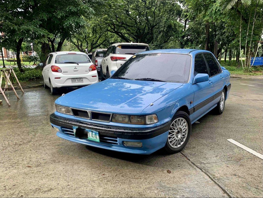Mitsubishi Galant MPI Auto (Category: Used Cars) located in Quezon City. Submitted by michaelreyes5611 (Listing ID 1461572189, Image 1). Description: Vintage classic Galant MPI. Automatic. Overhauled engine at 162k kilometers. Carbureted engine. Registered until 2027. Extra pair of rear lights. For serious enthusiast collectors buyers only..