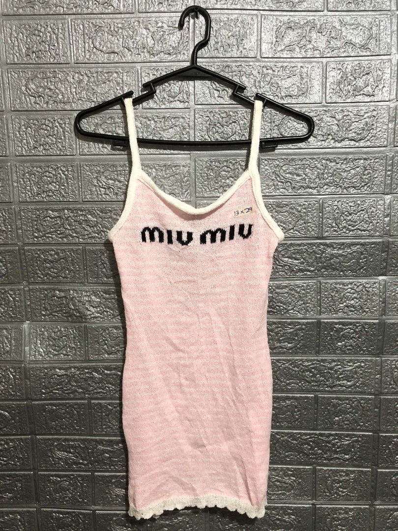 Miu Miu Script Top (Category: Sleeveless) located in Manila. Submitted by wildshark-33d3 (Listing ID 1461765866, Image 1). Description: Authentic Excellent condition Size Small Women No issue.