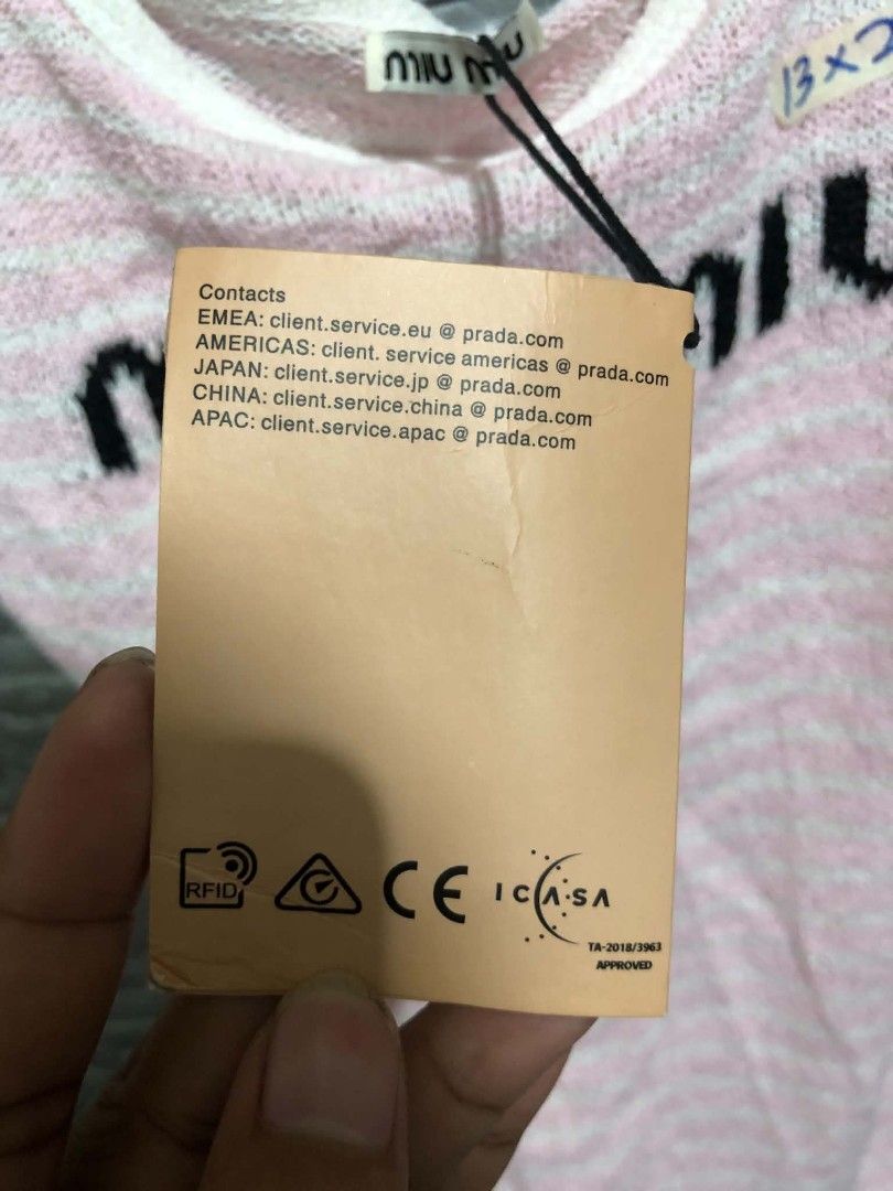 Miu Miu Script Top (Category: Sleeveless) located in Manila. Submitted by wildshark-33d3 (Listing ID 1461765866, Image 3). Description: Authentic Excellent condition Size Small Women No issue.