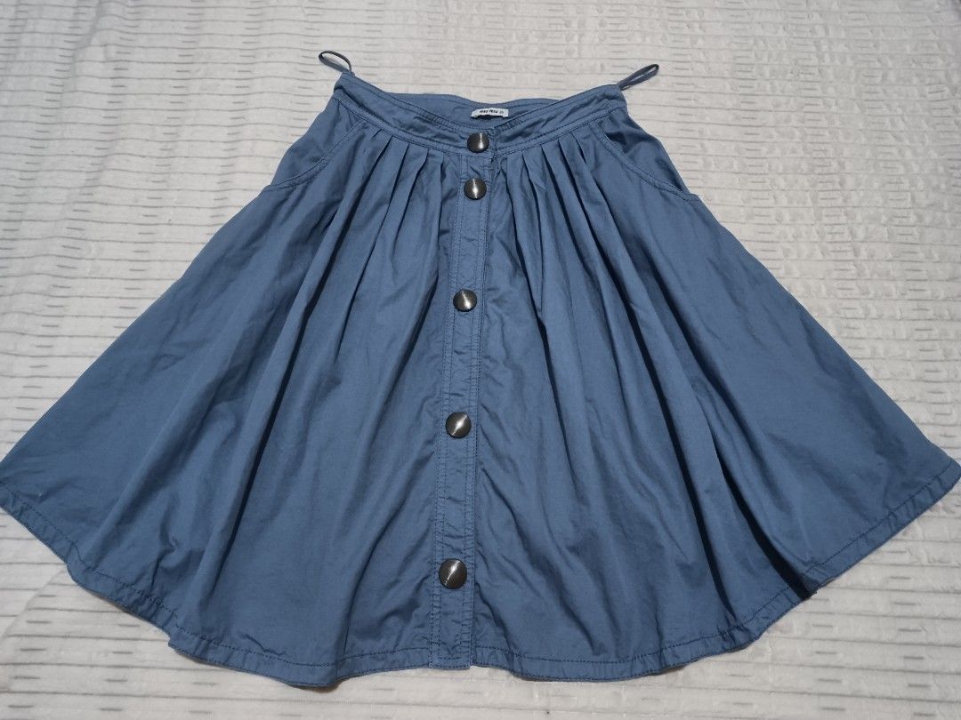 Miu Miu Skirt + 84 SF (Category: Luxury Apparel) located in Cebu City. Submitted by OneStop_ThriftShop_Mo (Listing ID 1461745574, Image 3). Description: Halloween Sale! 🎃🎃🎃 Miu Miu 😍😍 Original Made in Italy Pulido ang tahi Premium quality fabric and buttons Super gaan lang nito Maganda ang kulay in actual Fits Size 38 W 12" (24" waist) L 20.5" front, 18.5" back 1K, Free Shipping Last photo ccto for price ref only.