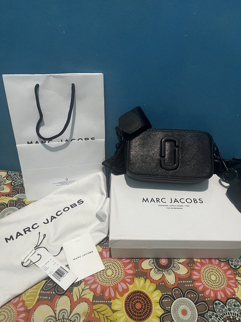 MJ Snapshot Bag (Category: Luxury Bags & Wallets) located in Manila. Submitted by lawriiianne (Listing ID 1461667273, Image 1). Description: Authentic MJ Snapshot Bag (used once only).