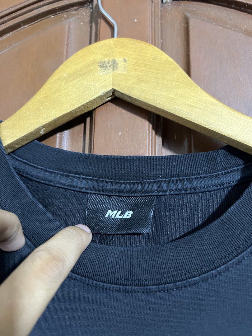 MLB Black Shirt (Category: Tshirts & Polo Shirts ) located in Manila. Submitted by thriftpoint99 (Listing ID 1461772756, Image 3). Description: 24x29 Issue not sure if stain or just needwash on sleeve part excellent condition.