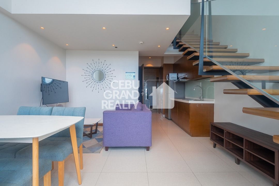Modern and Stylish Loft with Panoramic Views in MSY Tower (Category: Apartments & Condos) located in Manila. Submitted by cebugrandrealty (Listing ID 1461572495, Image 2). Description: Property ID: RCMR10 Type: Loft Condo for Rent Location: MSY Tower, Cebu Business Park, Cebu City Bedroom: 1 Bathroom: 1 Floor Area: 53 SqM Furnishing: Fully Furnished Parking: 1 Car Property Features: • Spacious dual-level loft layout • Double-volume high ceiling i