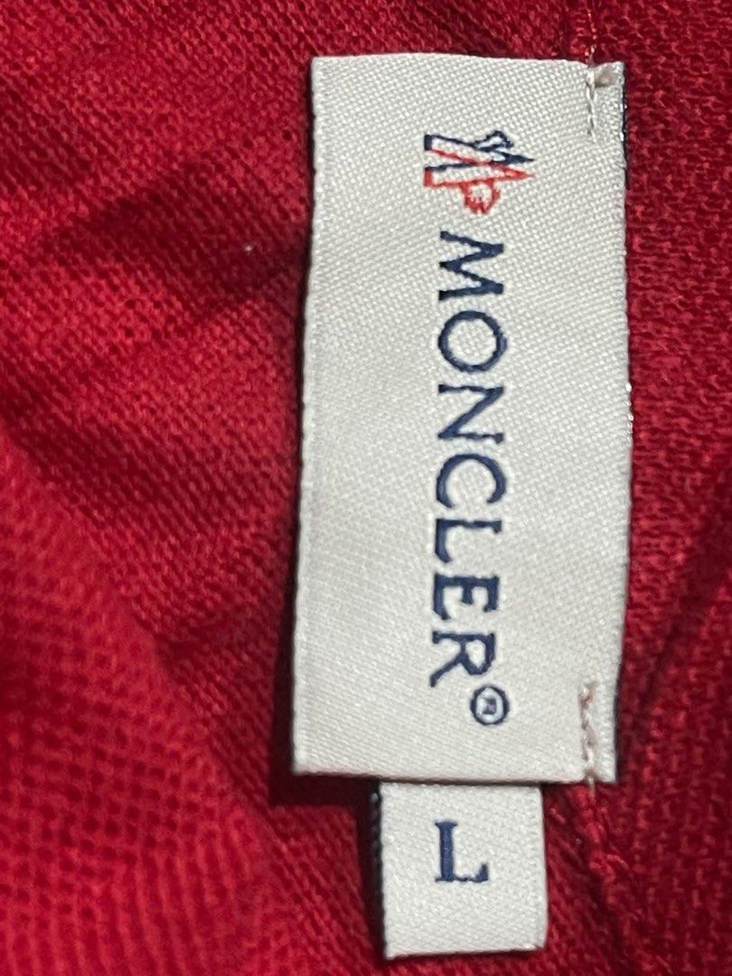 Moncler Red Sleeveless Polo Top (Category: Blouses) located in Donsol. Submitted by saksthriftavenuebyluckymaria8 (Listing ID 1461601014, Image 3). Description: - Moncler Red Sleeveless Polo Top - Size: L - Button closure at the neck - White trim on sleeves and collar CUT Washtags - Ideal for casual or sporty outfits Moncler red sleeveless Polo top Sz L chest 18in armhole 9in shoulder 14in length 25in cotton stretchable It features a distinct rib