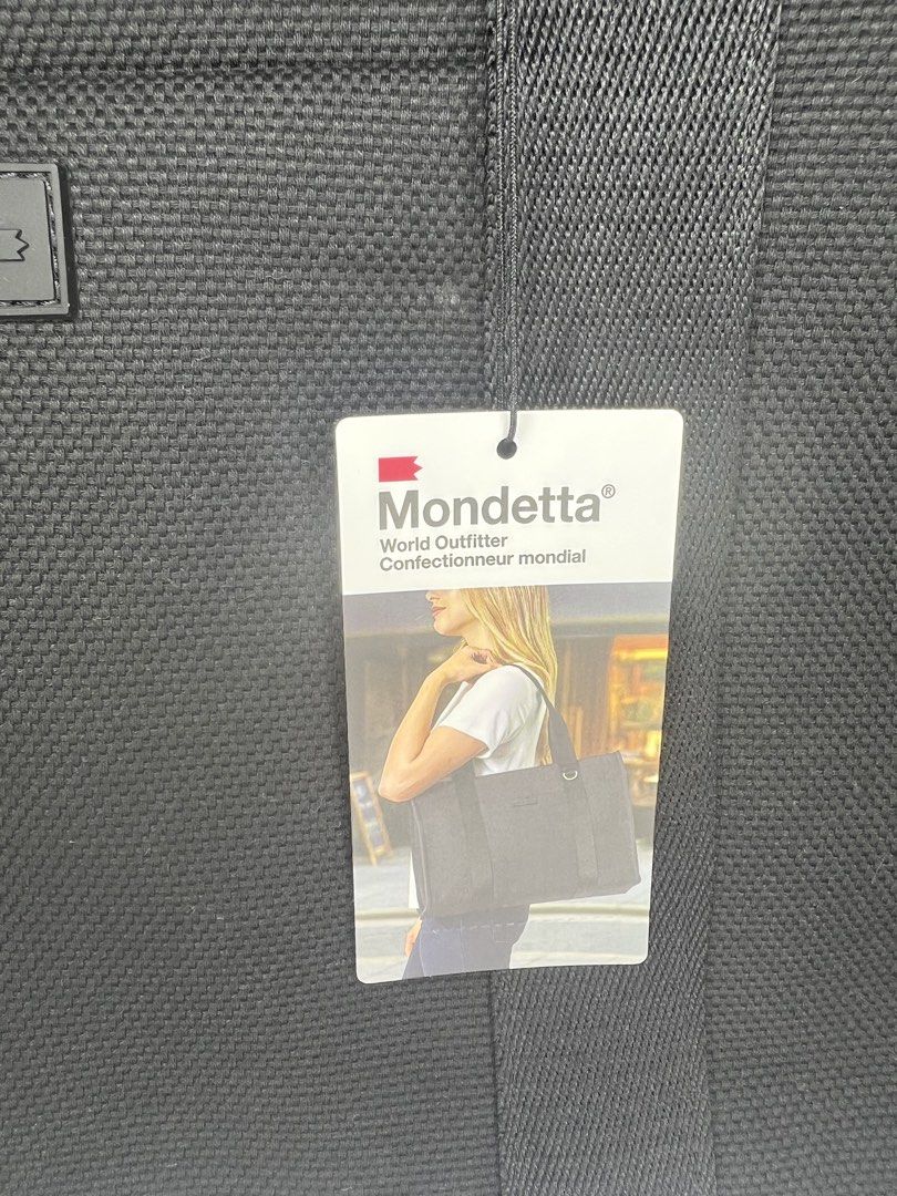 Mondetta World Outfitter Tote Bag (Category: Tote Bags) located in Quezon City. Submitted by gigisantos (Listing ID 1461605175, Image 2). Description: - Mondetta tote bag black - Textured weave for a stylish look - Convenient front pocket for quick access - Sturdy handles for comfortable carrying - Brand new with original tags attached - Ample interior space, ideal for everyday essentials or travel needs 100% original from USA/Canada Brand new Mo