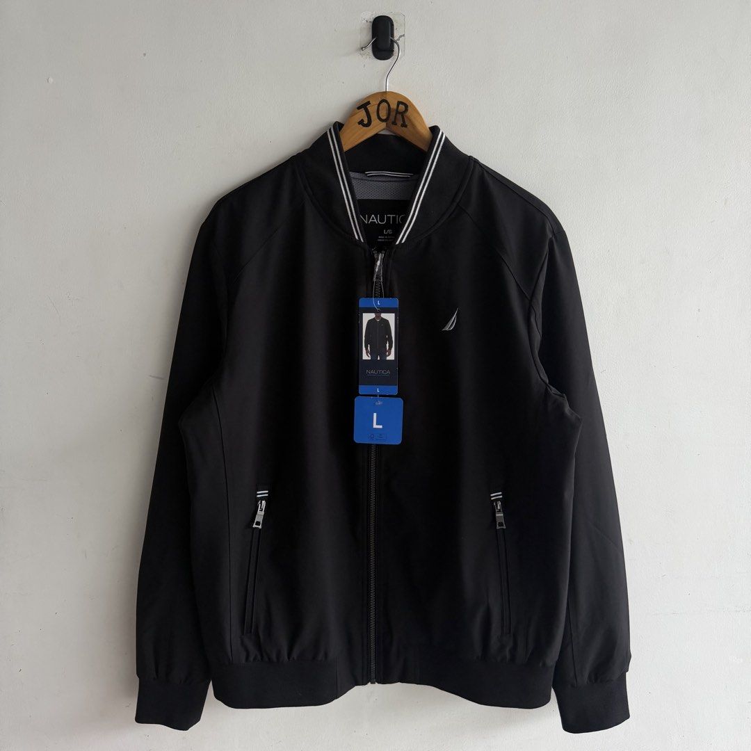 Nautica Water Resistant Bomber Jacket (Category: Coats, Jackets and Outerwear) located in San Fernando. Submitted by jorjorr (Listing ID 1461743414, Image 1). Description: Nautica Water Resistant Bomber Jacket Brand new w/ hangtag Original 💯 Large on tag 25 width 29 length Best fit large to xl No issue P2,499.