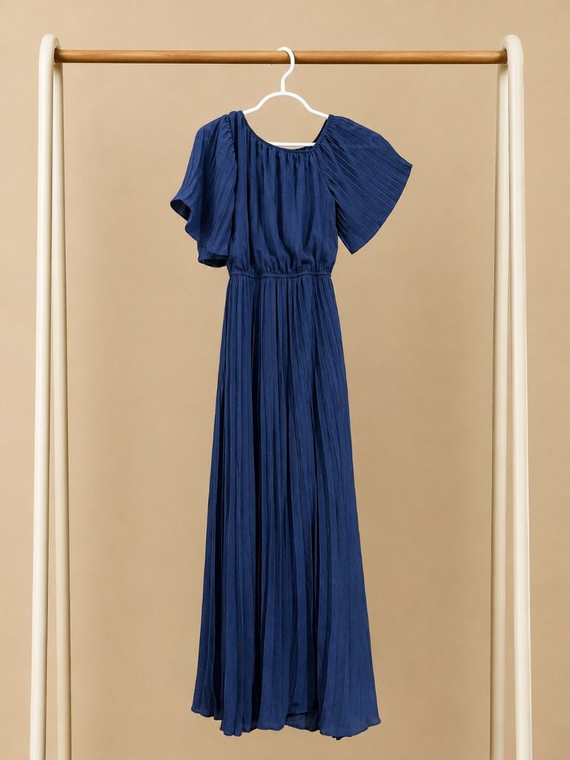 Navy Blue Pleated Midi Dress with One-Shoulder Design (Category: Dresses) located in Makati City. Submitted by aesthethings_ph (Listing ID 1461717607, Image 2). Description: - Navy blue midi dress - Pleated skirt - One-shoulder neckline - Includes tie belt for waist cinching - Flutter sleeves - Ideal for events or a night out - Comfortable and flowy material.