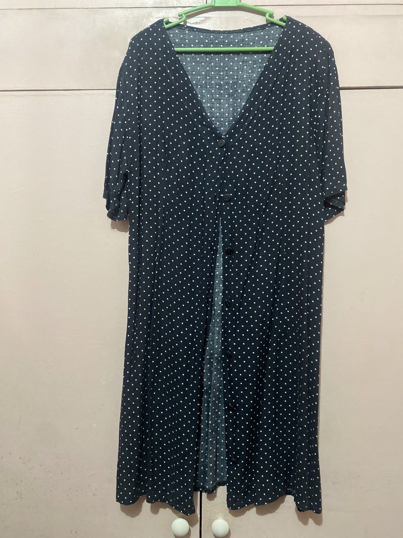 Navy Blue Polka Dot Button-Up Dress (Category: Dresses) located in Manila. Submitted by angelaay143 (Listing ID 1461771420, Image 1). Description: - Black dress - White polka dot pattern - V-neckline with button-up front - Short sleeves - Easy to style - Needs laundry stored too long at the cabinet.