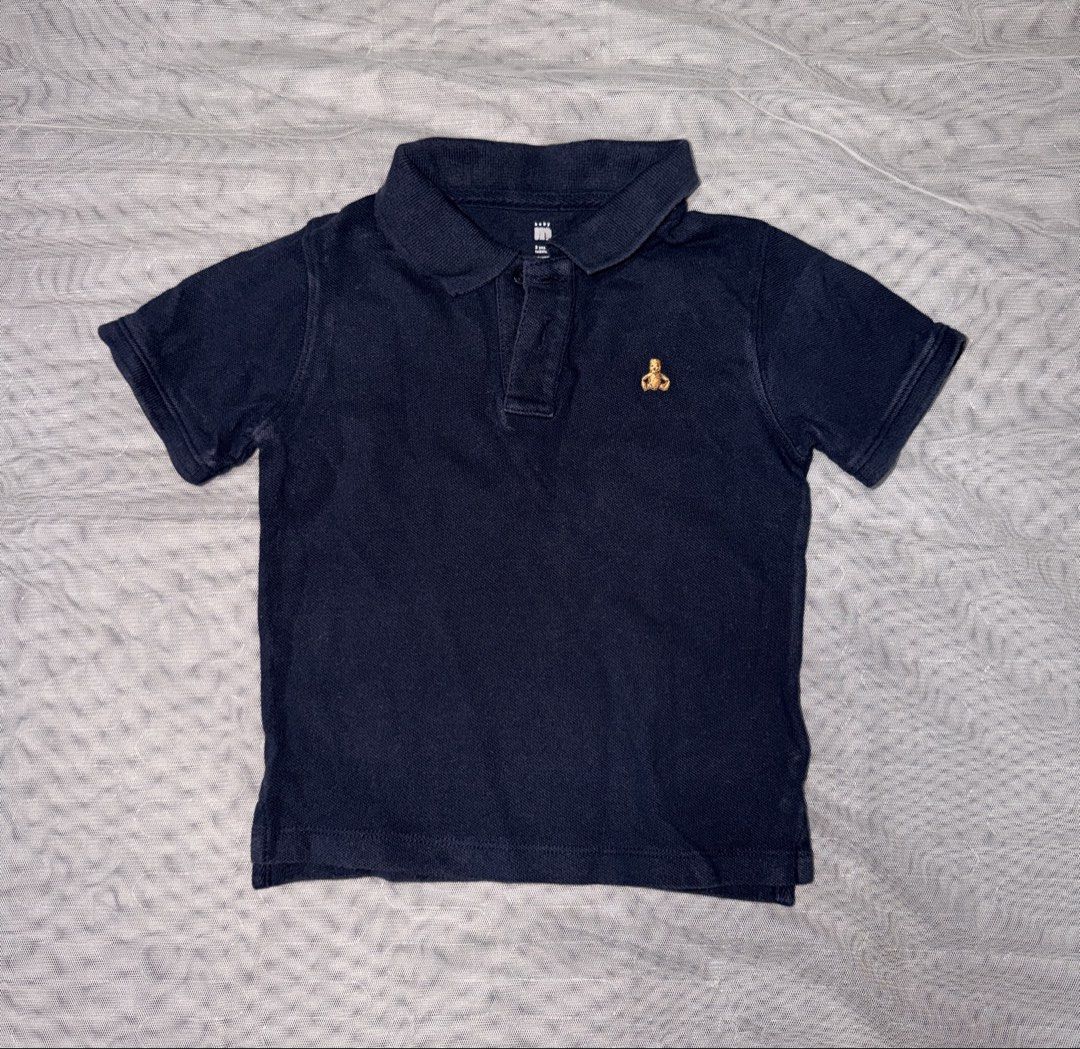 Navy Blue Polo Shirt (Category: Babies & Kids Fashion) located in Caloocan City. Submitted by mrynn_declutter (Listing ID 1461623171, Image 1). Description: Fits 2-4 years old.