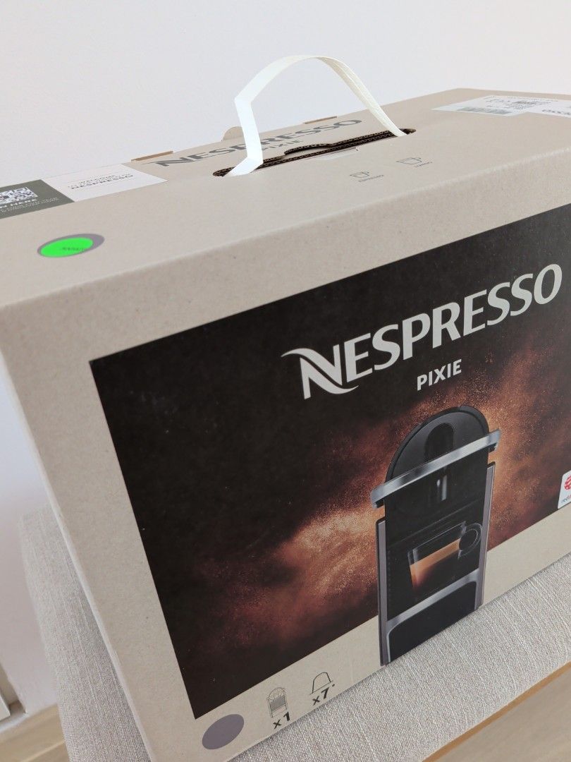 Nespresso Pixie Coffee Machine (Category: Coffee Machines & Makers) located in Singapore. Submitted by bryanchen1995lfg (Listing ID 1461655585, Image 3). Description: - Nespresso Pixie Titan coffee machine - Free Descaling Kit worth SGD33 (for cleaning of machine) - Used but not abused (brew 1 pod daily on average) - Slightly over 1 years old - No visible wear and tear - Compact size for easy storage - Perfect for singles/couples daily usage - Bo