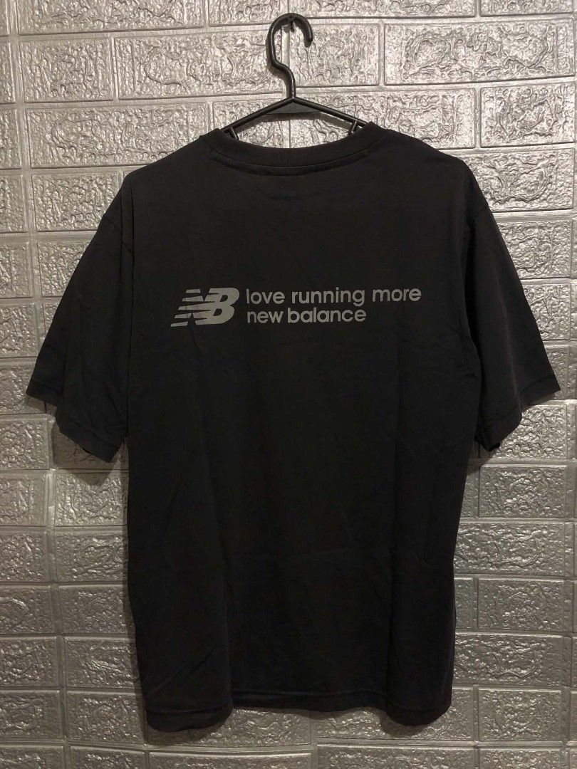 New Balance Shirt (Category: Earphones) located in Manila. Submitted by wildshark-33d3 (Listing ID 1461769868, Image 2). Description: Authentic Good condition issue check last picture / minimal hairline logo sa back print.