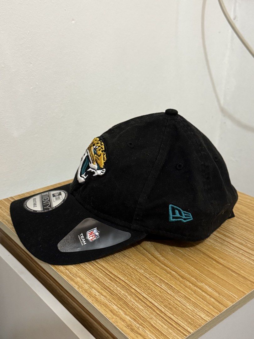 New Era Jacksonville Jaguars 9TWENTY Adjustable Cap (Category: Caps & Hats) located in Bulacan. Submitted by alshopie (Listing ID 1461627619, Image 3). Description: - Brand: New Era - Team: Jacksonville Jaguars - Model: 9TWENTY (Adjustable) - Color: Black - Features: Embroidered team jaguar logo on front - Condition: like new with NFL Team Apparel tag attached - Perfect for any Jaguars fan!.