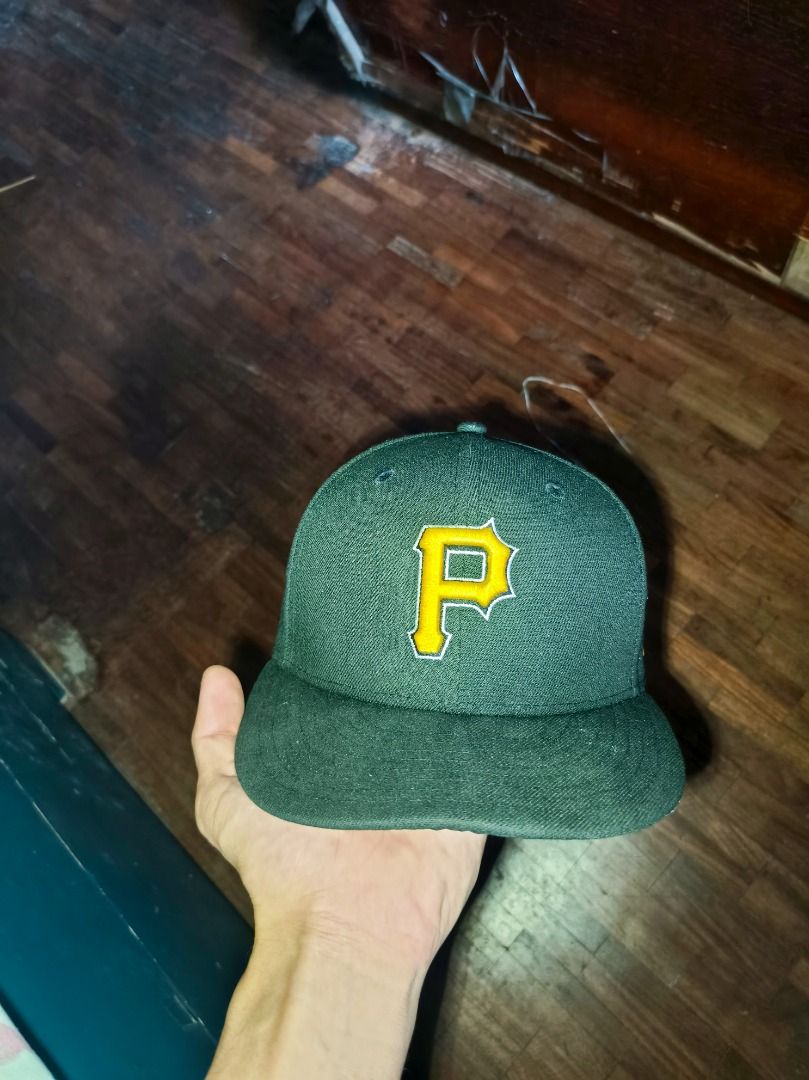 New Era Pittsburgh Pirates Fitted Baseball Cap (Category: Caps & Hats) located in Caloocan City. Submitted by sumiyagggg (Listing ID 1461591261, Image 1). Description: - Brand: New Era - Model: 59FIFTY - Team: Pittsburgh Pirates - Size: 7 1/4 - Features: Iconic 'P' logo on front, MLB logo on back, New Era logo on side - Condition: New - Ideal for: Any Pittsburgh Pirates fan.