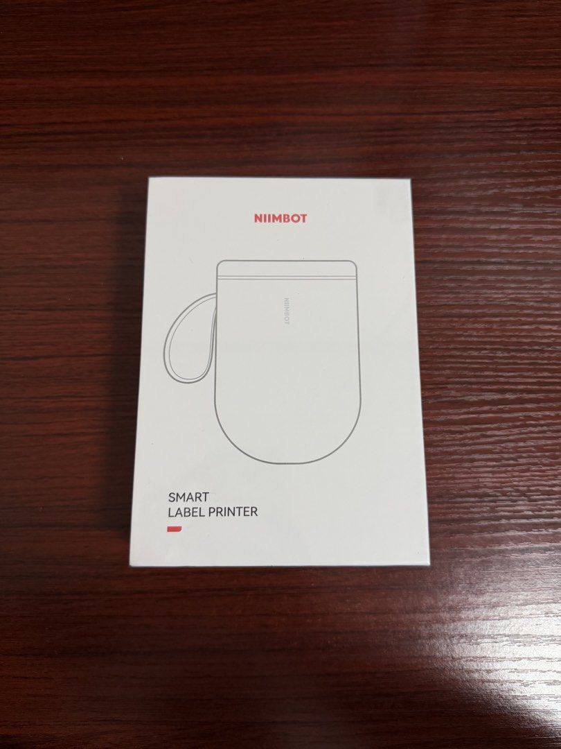 NIIMBOT D11H Label Printer (Sealed) (Category: Printers, Scanners & Copiers) located in Quezon City. Submitted by teejcoching (Listing ID 1461623075, Image 1). Description: Item: NIIMBOT D11H Label Printer (Sealed & Brand New) Price: ₱1,500 Color: White Battery Capacity: 1500mAh RFS: No plans on unwrapping/using it anymore..