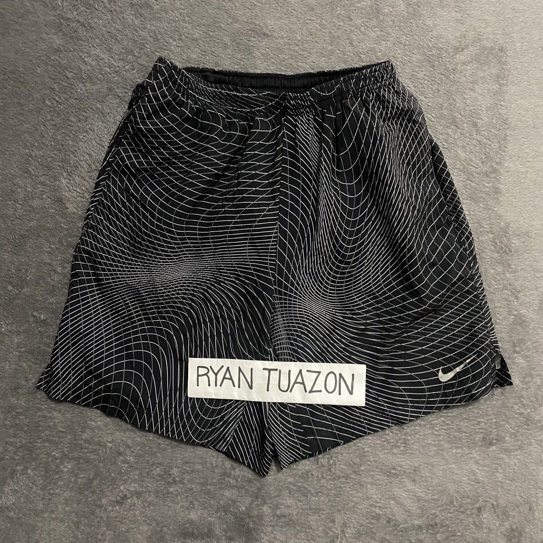 Nike 7” Distance Printed Running Shorts (Category: Shorts) located in Lubao. Submitted by thriftlangph (Listing ID 1461765308, Image 2). Description: 🏷️P499 Nike 7” Distance Printed Running Shorts 26 to 32W x 17L 12 leg opening 9/10 color rate Good condition Honest issue faded na yung reflector sa swoosh logo.