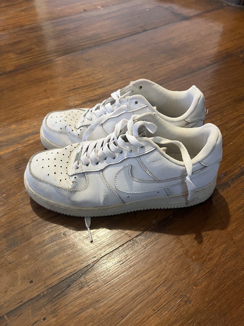 Nike Air Force 1 White Sneakers (Category: Sneakers) located in Pasig City. Submitted by martin.as (Listing ID 1461630264, Image 1). Description: - Classic white Nike Air Force 1s Bought in 2021 - Laces are intact - Great for everyday wear or customization.