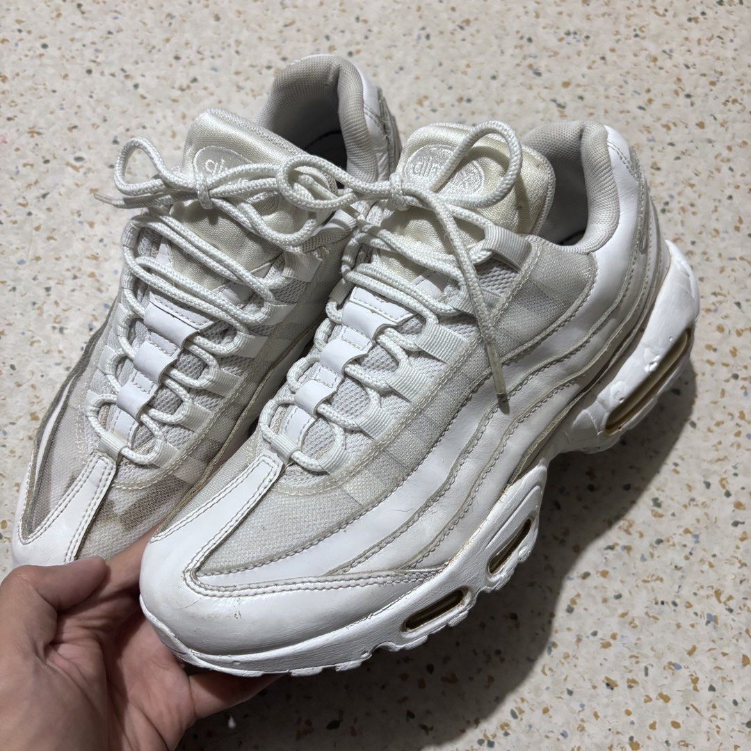 Nike Air Max 95 White Sneakers (Category: Sneakers) located in Baguio. Submitted by rhayburn (Listing ID 1461716468, Image 1). Description: - White Nike Air Max 95 - Size: US 9.5 / UK 7 / EUR 41 - Style: Classic, great for casual wear.