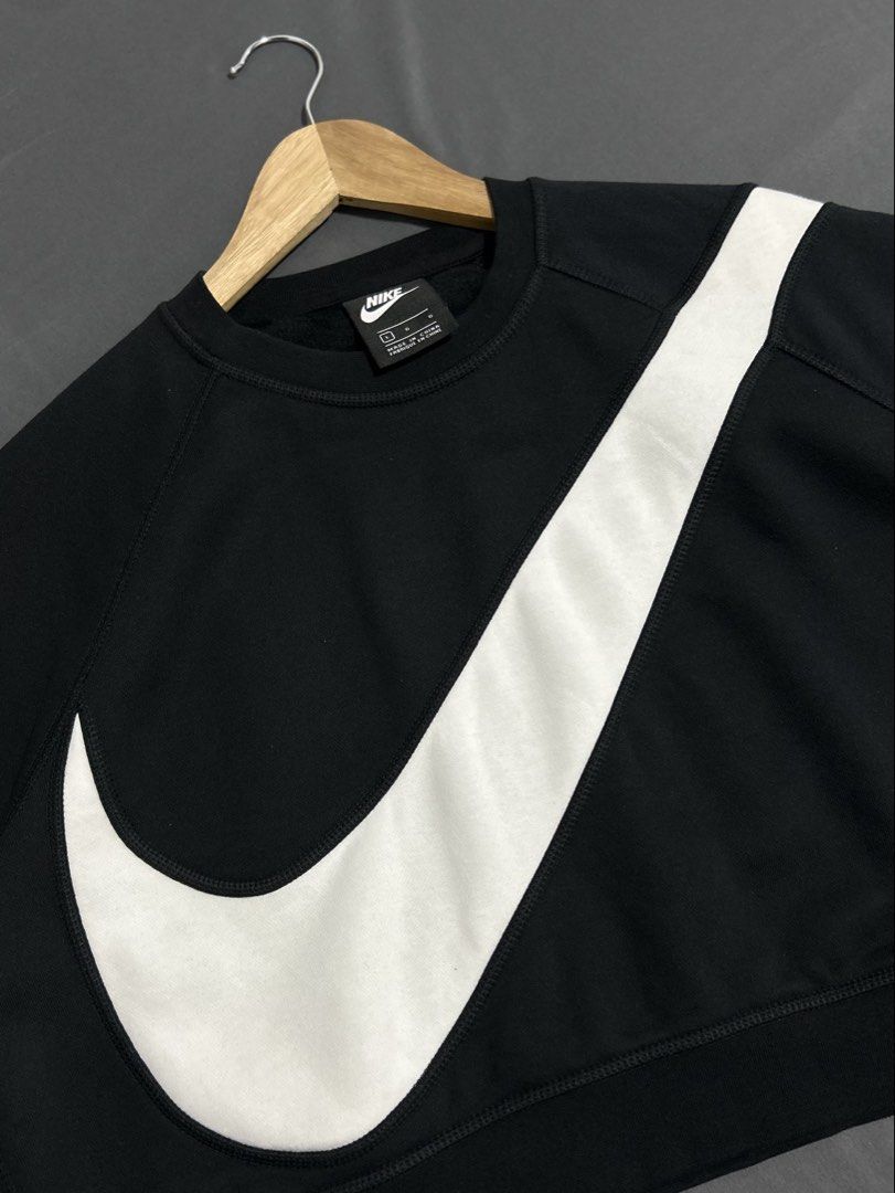 Nike Black Cropped Swoosh Sweatshirt (Category: Longsleeves) located in Cavite. Submitted by gnthrift (Listing ID 1461577108, Image 2). Description: Nike Sportswear Swoosh Round Neck Size: L on tag Dimes: 23.5x18.5 Color Rate: 9.8/10 Complete tags (black tag) Good as new condition Mine 680 + SF Location: Indang, Cavite MOP: Gcash Courier: J&T Express.