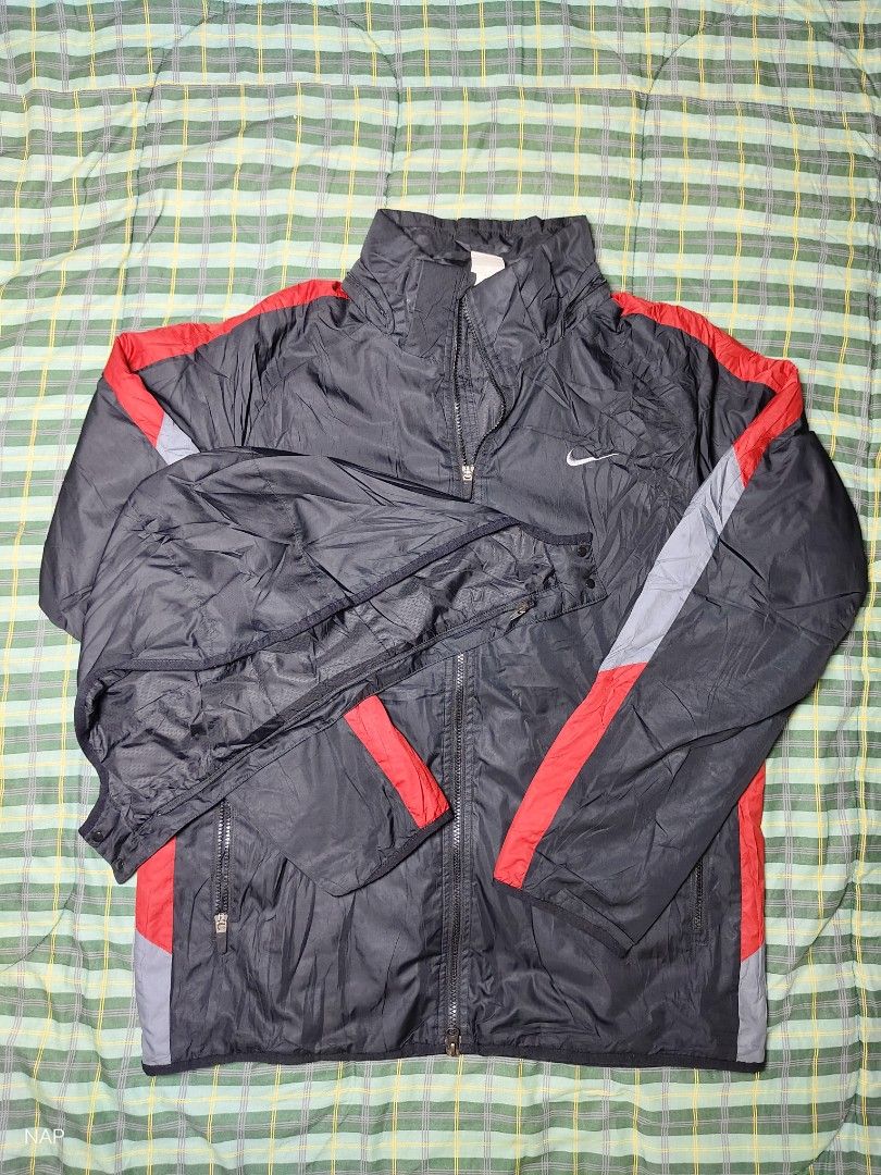 Nike Black Red Grey Hooded Jacket XL (Category: Coats, Jackets and Outerwear) located in Bayugan. Submitted by boss_rej (Listing ID 1461593755, Image 1). Description: - Nike Jacket - Size: XL - Colors: Black, Red, Grey - Features: Zip-away hood - Material: Polyester lining and fill - Ideal for: Outdoor activities and casual wear - Made in: China.