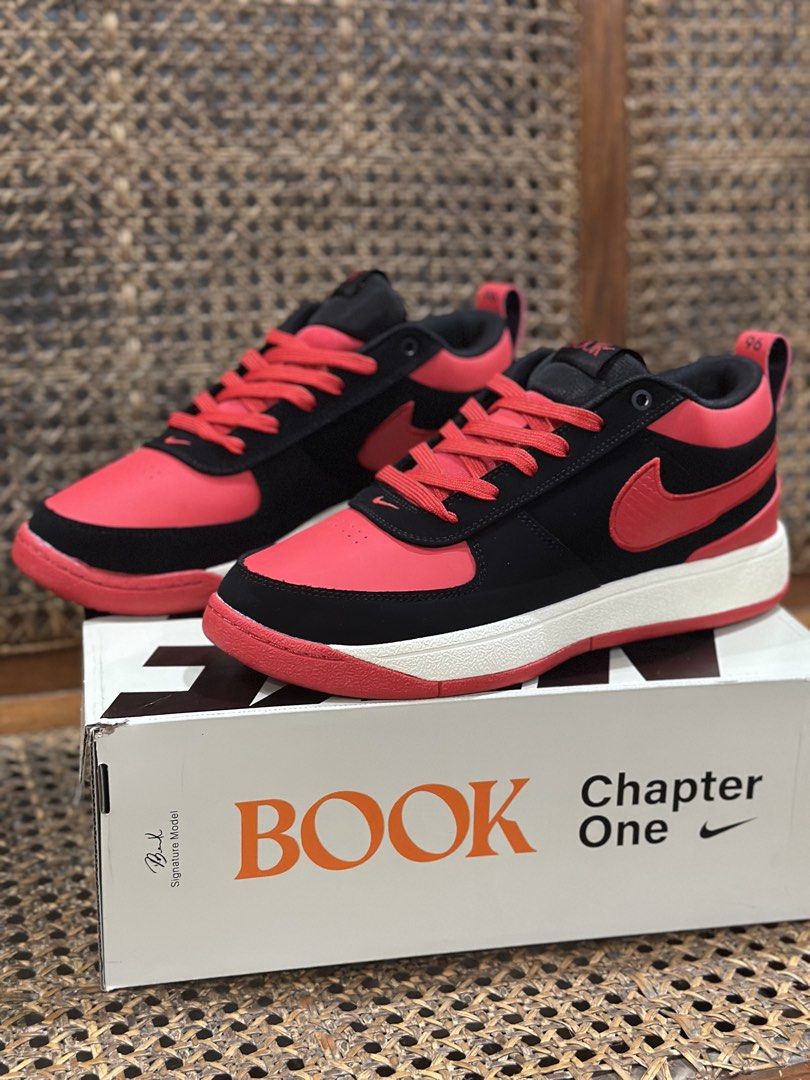 Nike Chapter One "BOOK" Red Black Sneakers (Category: Sneakers) located in San Rafael. Submitted by davemoya453442 (Listing ID 1461728818, Image 1). Description: - Nike sneakers in striking red and black colorway. - Features "Chapter One" branding on the heel tabs. - Soles are detailed with "AIR ZOOM" text. - Includes the original box for safekeeping. - Ideal for everyday casual wear..