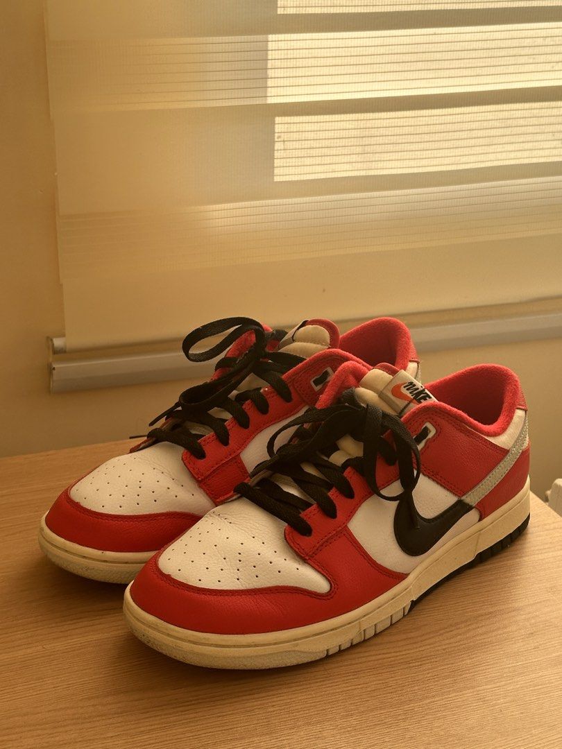 Nike Dunk Low Chicago Split (Category: Sneakers) located in Dasmarinas. Submitted by aubreyanabee (Listing ID 1461717905, Image 2). Description: - Classic Nike Dunk - Red and white colorway with black accents - Low-top silhouette - Black laces - Selling to declutter shoe collection.
