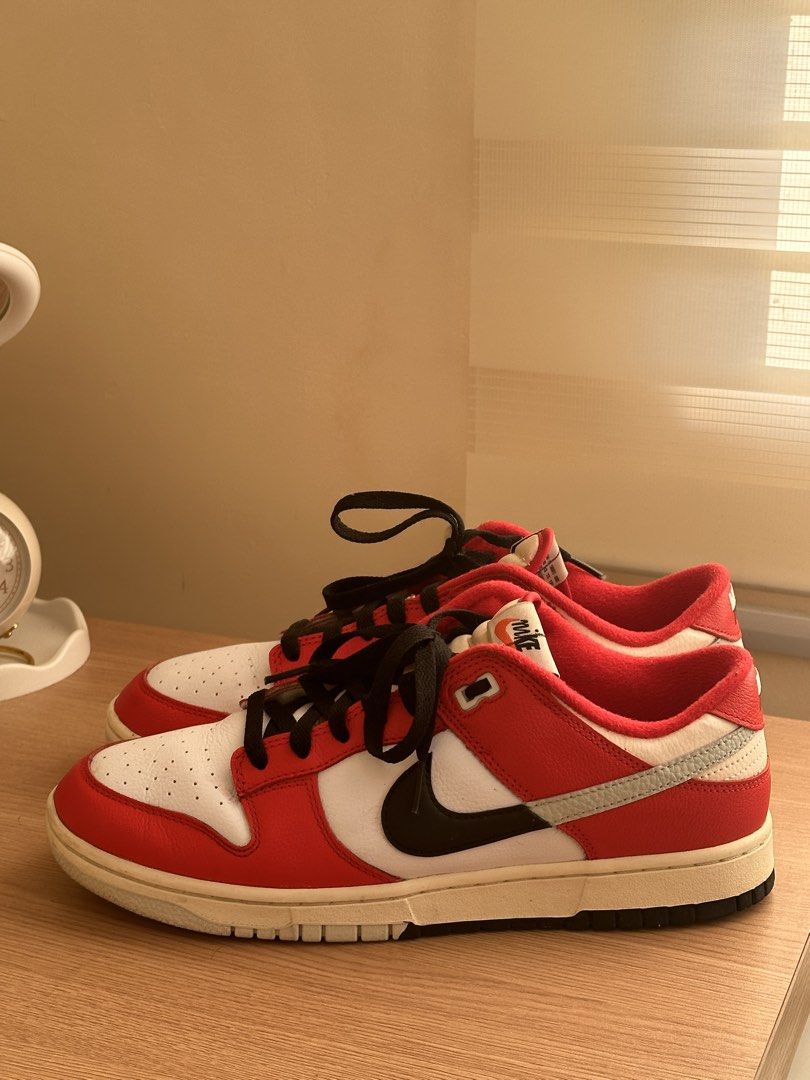 Nike Dunk Low Chicago Split (Category: Sneakers) located in Dasmarinas. Submitted by aubreyanabee (Listing ID 1461717905, Image 3). Description: - Classic Nike Dunk - Red and white colorway with black accents - Low-top silhouette - Black laces - Selling to declutter shoe collection.