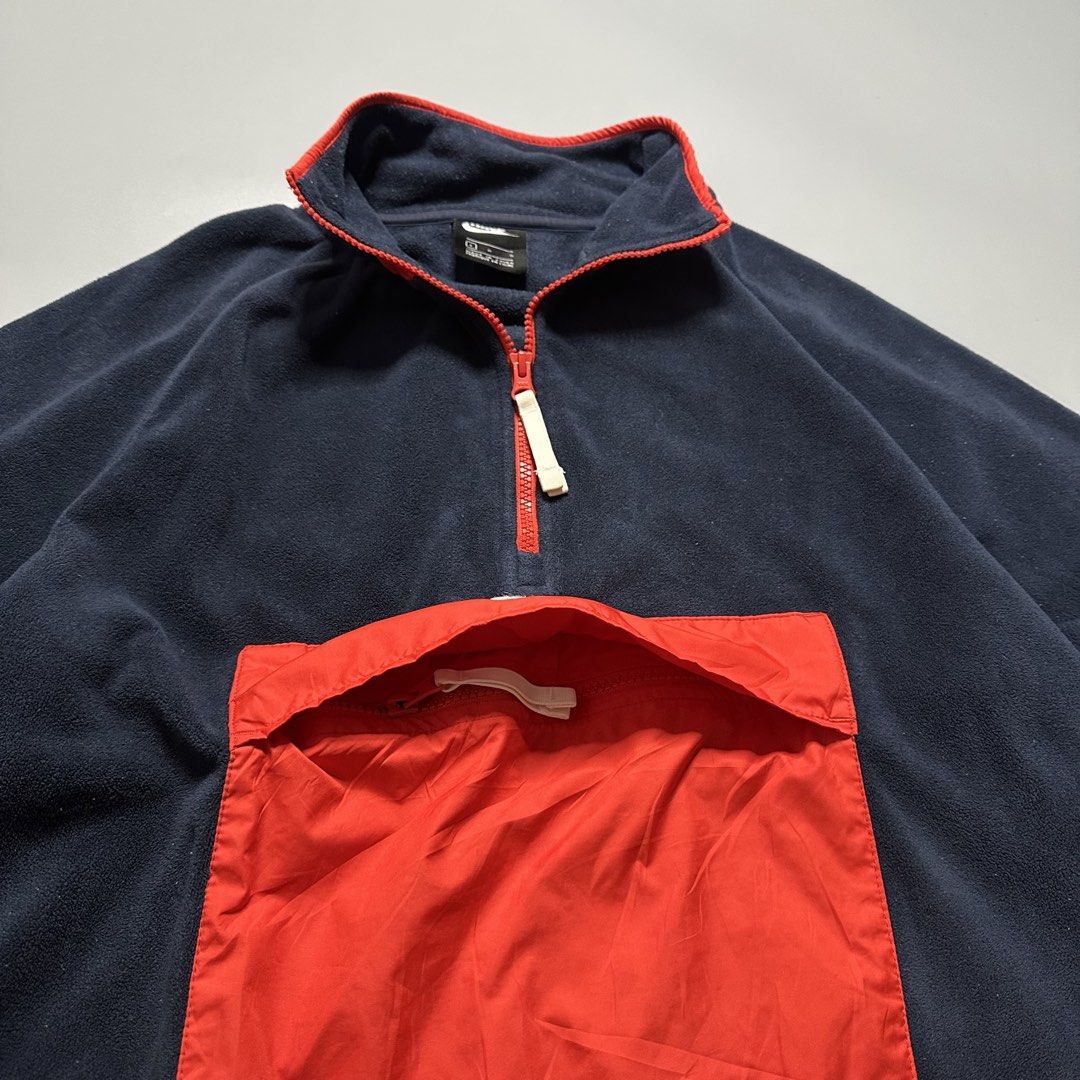NIKE HALF ZIP JACKET (Category: Coats, Jackets and Outerwear) located in Baguio. Submitted by subaitems (Listing ID 1461627174, Image 2). Description: - Classic Nike fleece pullover - Color: Navy blue with bright red chest pocket and collar - Closure: Half zip with red zipper - Size: L - Perfect for warmth and style.