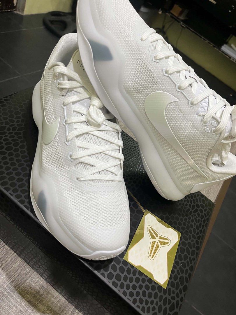 Nike Kobe Protro White Basketball Shoes (Category: Sneakers) located in Manila. Submitted by marceline_99 (Listing ID 1461728664, Image 2). Description: - White Nike Kobe Protro basketball shoes - Size 12 US Men's - Comes with original box - Includes a Kobe sticker - Brand New w/ receipt & mamba legacy card Titan Release 11,295 📍: valenzuela city 🚚 : lalamove, grab, lbc etc 📩: DM for inquiries.