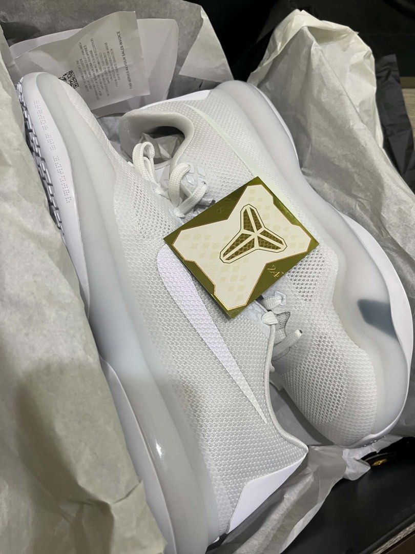 Nike Kobe Protro White Basketball Shoes (Category: Sneakers) located in Manila. Submitted by marceline_99 (Listing ID 1461728664, Image 3). Description: - White Nike Kobe Protro basketball shoes - Size 12 US Men's - Comes with original box - Includes a Kobe sticker - Brand New w/ receipt & mamba legacy card Titan Release 11,295 📍: valenzuela city 🚚 : lalamove, grab, lbc etc 📩: DM for inquiries.