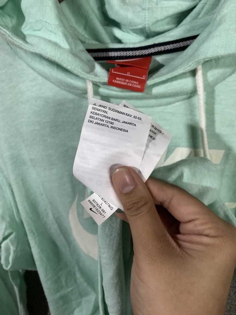 Nike mint Hoodie (Category: Coats, Jackets and Outerwear) located in Paranaque City. Submitted by thrift_in_the_hoods (Listing ID 1461781996, Image 3). Description: Dimes: 19x24 Size: Medium Issue: None .