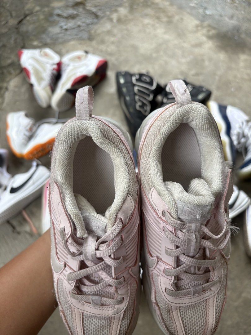 Nike Pink Mesh Running Shoes (Category: Sneakers) located in Marikina City. Submitted by kuyamosafe (Listing ID 1461575769, Image 3). Description: - Pink Nike sneakers with mesh detailing - Secure lace-up closure - Comfortable for everyday wear or light jogs - Minor signs of wear on soles and uppers - Plenty of life remaining.