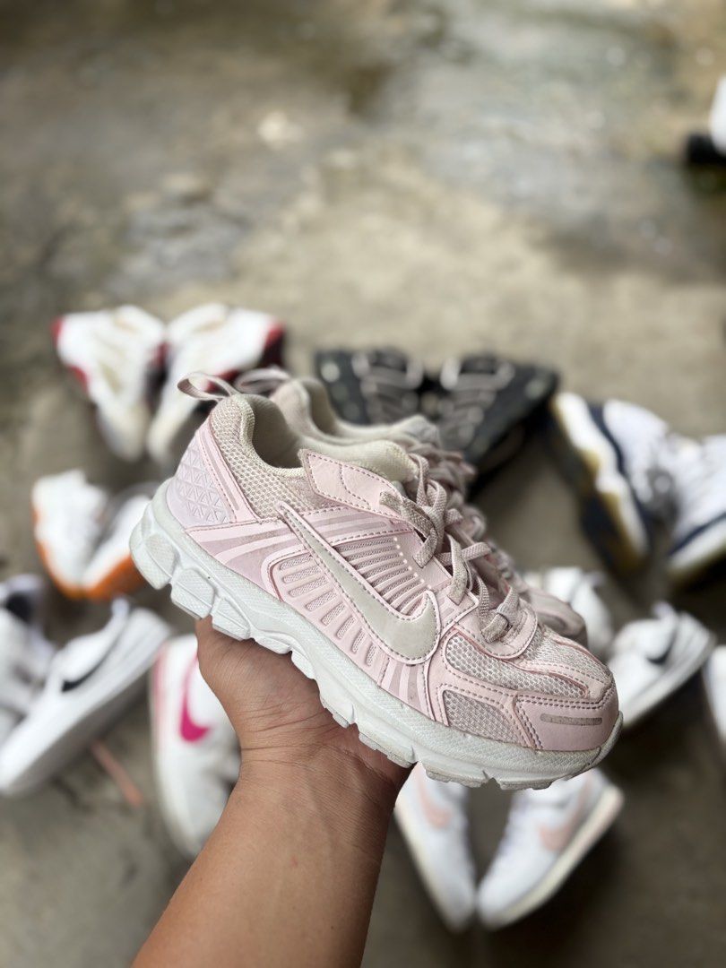 Nike Pink Mesh Running Shoes (Category: Sneakers) located in Marikina City. Submitted by kuyamosafe (Listing ID 1461575769, Image 1). Description: - Pink Nike sneakers with mesh detailing - Secure lace-up closure - Comfortable for everyday wear or light jogs - Minor signs of wear on soles and uppers - Plenty of life remaining.