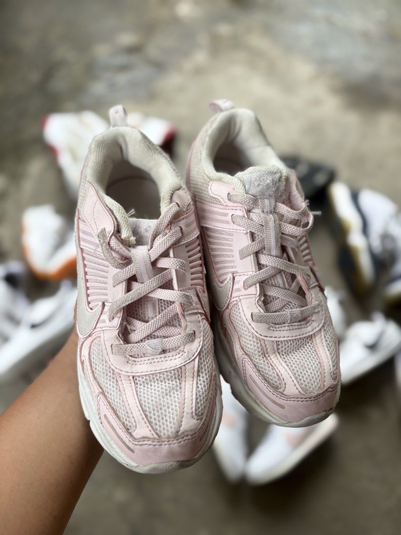 Nike Pink Mesh Running Shoes (Category: Sneakers) located in Marikina City. Submitted by kuyamosafe (Listing ID 1461575769, Image 2). Description: - Pink Nike sneakers with mesh detailing - Secure lace-up closure - Comfortable for everyday wear or light jogs - Minor signs of wear on soles and uppers - Plenty of life remaining.