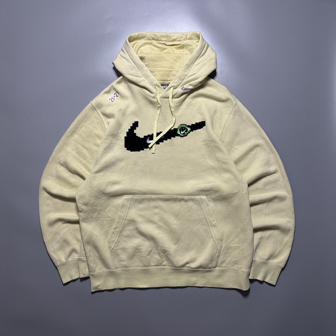 Nike Pixel Swoosh Hoodie Jacket (Category: Coats, Jackets and Outerwear) located in Baguio. Submitted by subaitems (Listing ID 1461628090, Image 1). Description: - Yellow Nike Hoodie - Size: XL - Pixelated Swoosh graphic - Kangaroo pocket - Drawstring hood.