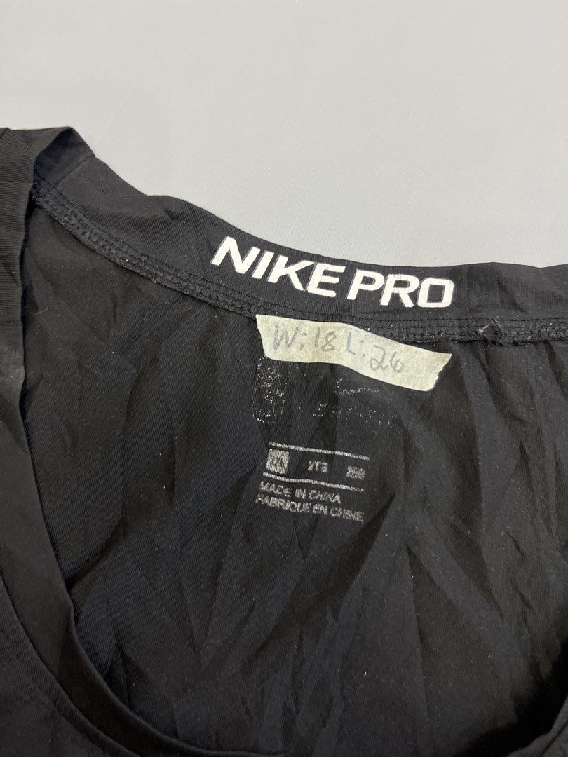 Nike Pro Dri-FIT Black Tank Top (Category: Activewear) located in Mabalacat. Submitted by aas_thriftfings (Listing ID 1461586639, Image 3). Description: - Black Nike Pro Dri-FIT Tank Top - Iconic Nike swoosh logo - Made in China - Ideal for workouts or casual wear - Comfortable and breathable material.