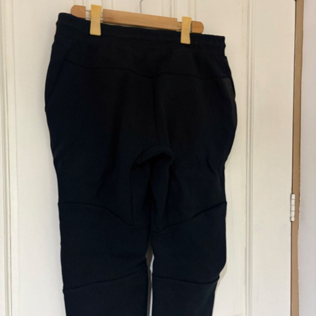 Nike Tech Fleece Joggers Black (Category: Joggers) located in Dapitan. Submitted by payt3es_thrift. (Listing ID 1461739551, Image 2). Description: NI~KE TECH FLEECE BLACK JOGGER PANTS 🖤 Clean and premium-looking Ni-ke joggers — perfect for casual wear, travel, gym, or everyday streetwear. ✅ Size: XL ✅ Color: Black 9.9/10 ✅ Drawstring elastic waistband ✅ Signature side zipper pocket ✅ Tapered jogger fit ✅ Ribbed ankle cuffs ✅ Ni-ke logo on front 