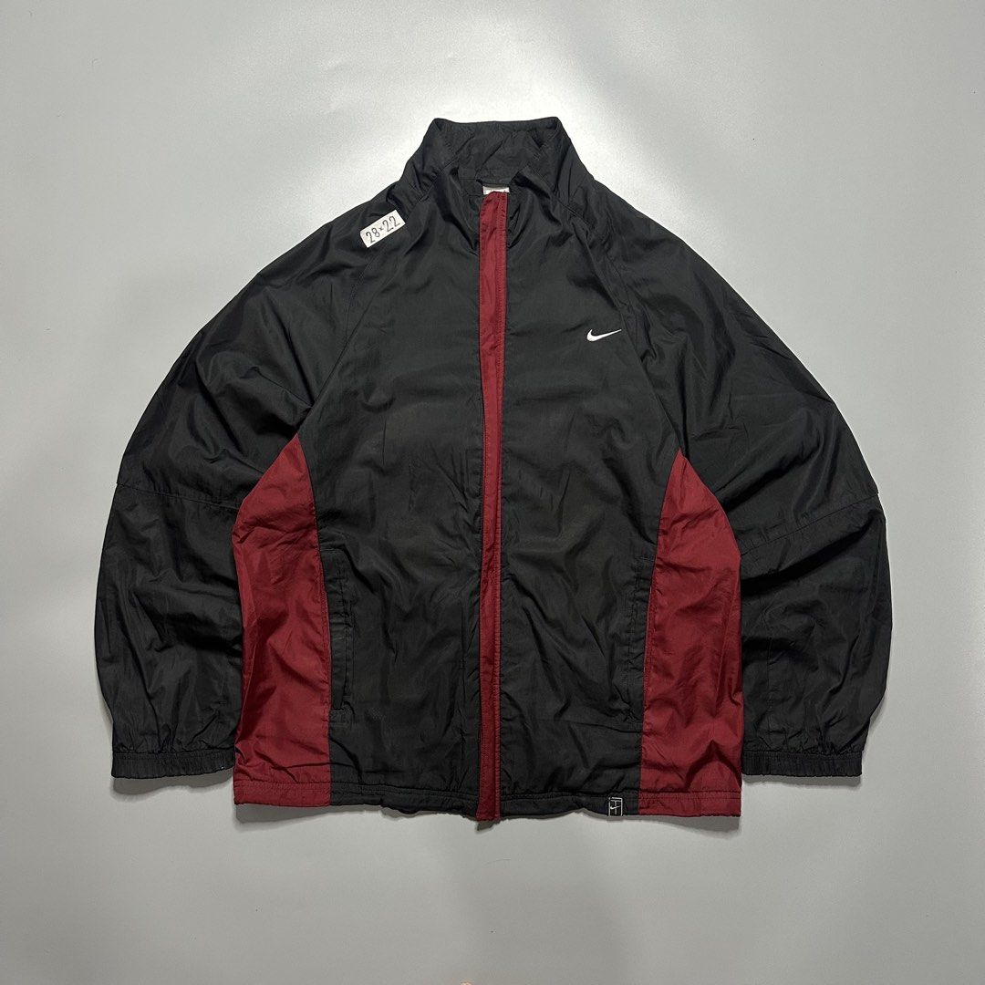 NIKE WINDBREAKER TRACK JACKET (Category: Coats, Jackets and Outerwear) located in Baguio. Submitted by subaitems (Listing ID 1461626813, Image 1). Description: - Classic Nike track jacket - Color: Black with maroon side panels - Features: Full zip front, stand-up collar, elasticated cuffs and hem - Technology: Nike Fit Storm - Size: L - Ideal for: Workouts or casual wear.