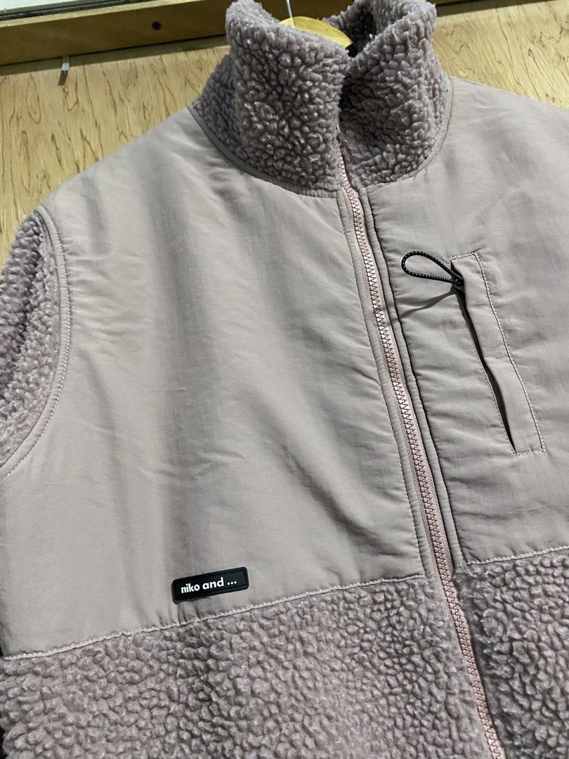 Niko and... Fleece and Quilted Jacket (Category: Coats, Jackets and Outerwear) located in Manila. Submitted by callejage69430 (Listing ID 1461731637, Image 2). Description: 24 width 28 Length - Brand: Niko and... - Color: Dusty Rose - Material: Cozy fleece sleeves and lower body, quilted nylon front and back panels - Features: Zipper closure, small chest pocket, fully lined interior - Style: Great for layering in cooler weather.