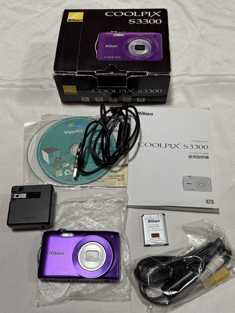 Nikon Coolpix S3300 (purple) (Category: Cameras) located in Baguio. Submitted by everythingmustgo2600 (Listing ID 1461562868, Image 1). Description: 16 megapixel 6x optical zoom Nikkor lens (26-156mm equivalent), 720p HD video recording, and lens-shift image stabilization. CONDITION: > in good working condition > has minor scratch but unit is still presentable (please refer to photos for body condition) > all buttons tested, zoom in/out tested, f