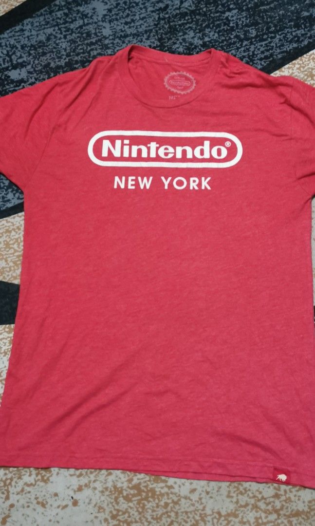 Nintendo graphic shirt (Category: Tshirts & Polo Shirts ) located in San Jose. Submitted by thrift_ni_sir (Listing ID 1461707767, Image 1). Description: Minimal crack prints MOD J&T ADD shipping fee MOP gcash.