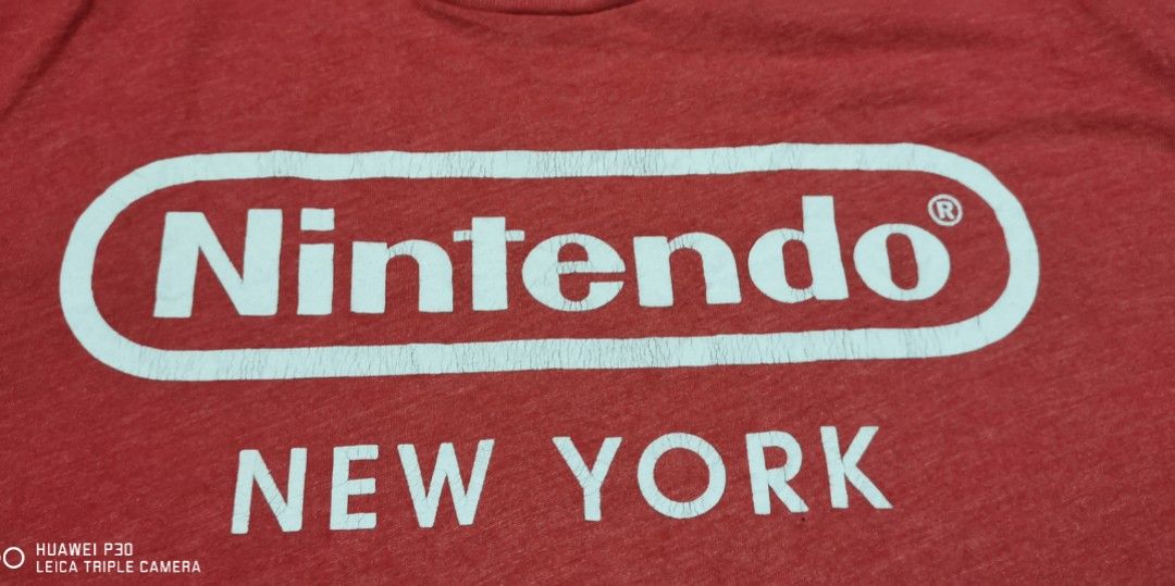 Nintendo graphic shirt (Category: Tshirts & Polo Shirts ) located in San Jose. Submitted by thrift_ni_sir (Listing ID 1461707767, Image 3). Description: Minimal crack prints MOD J&T ADD shipping fee MOP gcash.