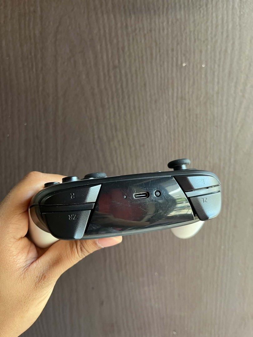 Nintendo pro controller (Category: Controllers) located in Quezon City. Submitted by all_about_retro (Listing ID 1461601064, Image 3). Description: Nintendo switch pro controller Super smash brod edition Tested Buttons working except ZL Meron ako video na tinetest Good battery Makinis unit Pickup.