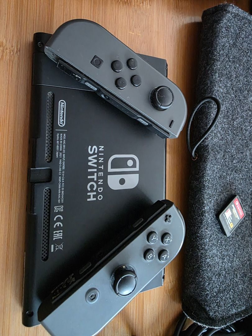RUSH SALE! Nintendo Switch v2 with + GTA Trilogy (Category: Nintendo) located in Mabalacat. Submitted by abehl (Listing ID 1461618216, Image 2). Description: - Nintendo Switch Console V2 HAC-001(-01) - Original Joy-Cons - Dock - Controllers - Original Charging Cable - Joy-Con Grip - HDMI OTHER INCLUSIONS: - SanDisk Ultra 128gb - GTA Trilogy (cartridge only, without case) - Quality Extra Wireless Controller - Quality Protective Case for Switch, Do