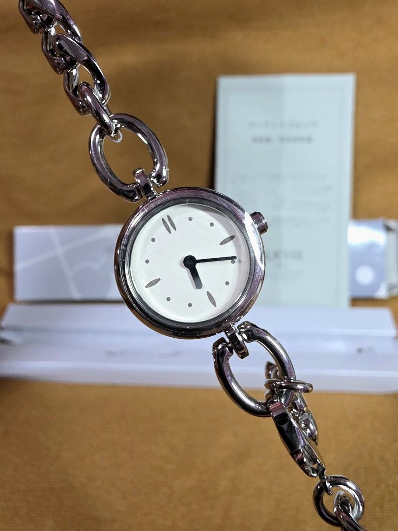 NOEVIR Two Way Watch Silver Chain Bracelet (Category: Women's Watches) located in Rosales. Submitted by akumie30 (Listing ID 1461679842, Image 1). Description: - NOEVIR Silver Chain Watch - Two-way function - Original box and manual included - Round white dial with black hands - Unique chain link design - Perfect accessory for any outfit All Original Working Condition Case Size 21.5mm, 23mm with Crown Wrist Size : 14.5cm - 20cm.