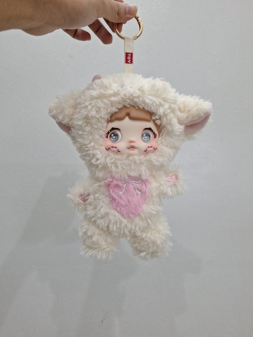 Nommi Nene Version 1 (Category: Plushies & Soft Toys) located in Cebu City. Submitted by lovely_goods.ceb (Listing ID 1461665741, Image 2). Description: - Nommi Nene Version 1 Plush - Soft and fluffy white material - Adorable facial details - Has thre different eyes you can change - Includes keychain ring -You can move its limbs - Still in really good condition. Good for giving as gift. RFS: Not used often already..