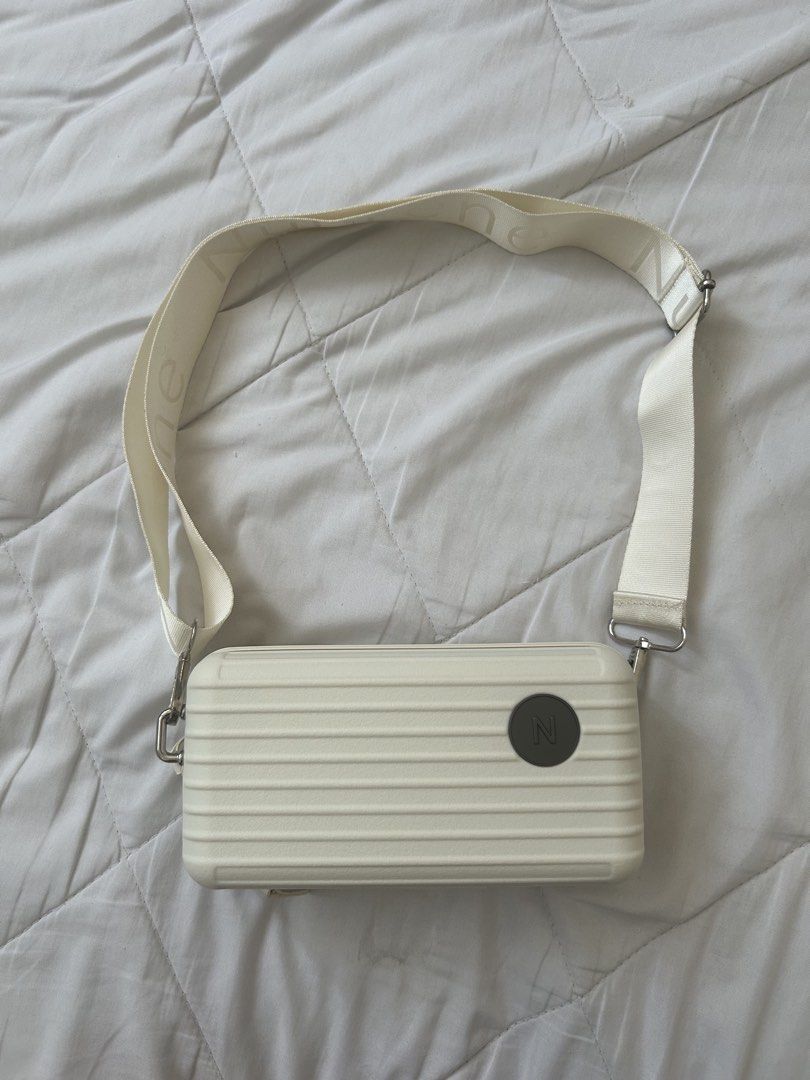 nuprene the lucca bag (Category: Cross-body Bags) located in Manila. Submitted by acesarchive (Listing ID 1461591142, Image 1). Description: nuprene lucca bag in off white 🤍 ⟡ never used ⟡ bought at PHP 1k+ ⟡ protective hardshell case ⟡ zipper and straps in good condition.